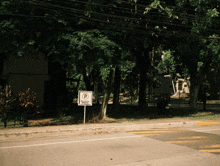 a sign on the side of the road that says " no parking "