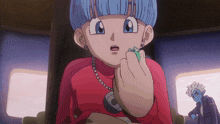 a cartoon character with blue hair and a red shirt