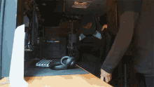 a black chair with the word republic on it sits on a wooden desk