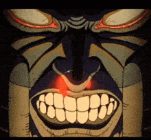 a close up of a cartoon character 's face with glowing red eyes