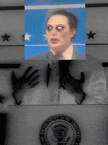 a picture of a man behind a podium that says president of the united states of america