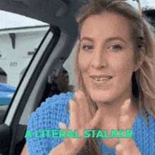 a woman in a blue shirt is sitting in a car with the words " a literal stalker " on the bottom