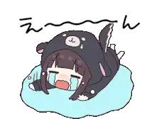 a girl in a bear costume is crying while laying on her back .