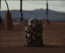 The Mandalorian Baby Yoda GIF - The Mandalorian Baby Yoda Frog GIFs