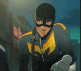 a man in a superhero costume is wearing a mask .