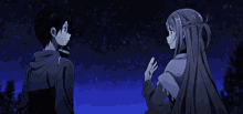 a man and a woman are holding hands under a starry night sky