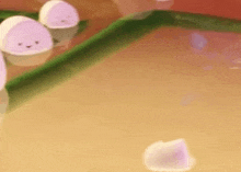 a bunch of marshmallows are floating on top of a table .
