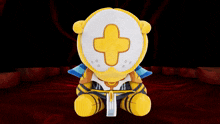 a stuffed animal with a cross on it 's face