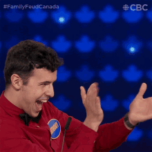 a man with a name tag that says anthony is clapping his hands
