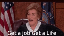 a judge sitting in front of an american flag with the words get a job get a life