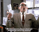 a man in a suit and tie is saying " would someone please shoot me "