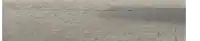 a person is standing next to a yellow minion on the sidewalk .