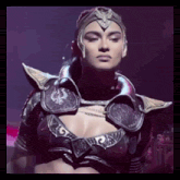 a woman in a costume with a crown on her head looks at the camera