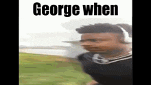 a man wearing headphones is running in a field with the words george when above him .