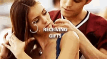 Paul Wesley Reicing Gifts GIF - Paul Wesley Reicing Gifts Nina Dobrev GIFs