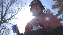 smile for the camera red bull zeb powell snowboarder champion