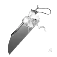 a saw with a white bow on it