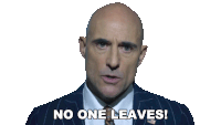 a man in a suit and tie says " no one leaves "