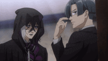 two anime characters are standing next to each other with one wearing a hood
