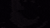 a person is standing in a dark room with a purple lightning bolt coming out of it .