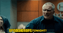 a man says " updated drops tonight " in front of a woman
