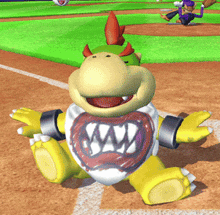 a cartoon character sitting on a baseball field wearing a shirt that says bowser on it