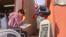 a man in a wheelchair is looking at a menu while a spiderman stands on a sign that says barber shop