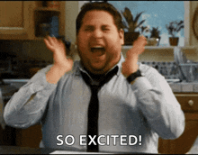 a man in a tie is screaming with the words so excited behind him