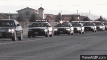 Cop Cars Funeral GIF - Cop Cars Funeral Funeral Procession GIFs