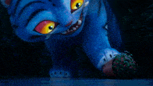 a blue cartoon cat with yellow eyes is playing with a potted plant