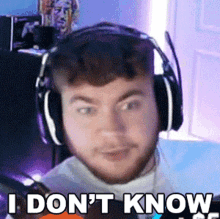 a man wearing headphones with the words " i don 't know " on the bottom
