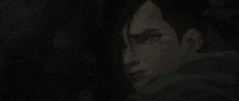 a person is holding a torch in a dark room with a fire in the background .