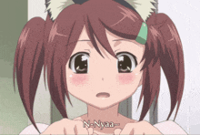 a girl with a cat ear and the word n-nyaa on her chest