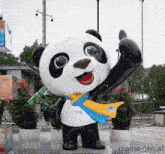 a statue of a panda bear wearing a white shirt with the word cite on it