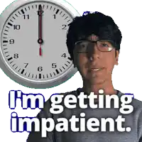 a man wearing glasses stands in front of a clock that says i 'm getting impatient