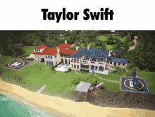 an aerial view of taylor swift 's house with a helicopter on the lawn