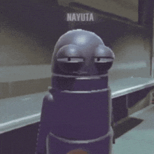 a purple robot with the name nayuta written on it