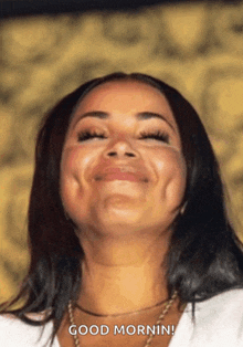 a woman making a funny face with the words " good morning " below her