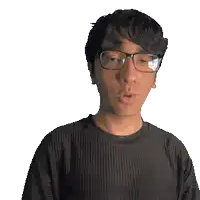 a man wearing glasses and a black wilson shirt