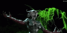 a female monster with red gloves is surrounded by green lightning bolts