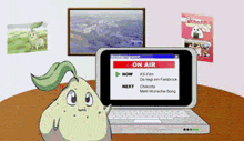a cartoon character is standing in front of a laptop that says on air