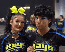 rays cheerleaders are posing for a picture with a rode microphone