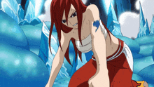 a girl with red hair and a fairy tail tattoo