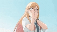 a girl with blonde hair is holding a green bottle of soda