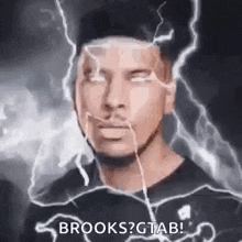a man is standing in front of a lightning bolt and says `` brooks ? gtab ! ''