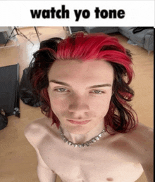 a shirtless man with red and black hair and the words watch yo tone above him
