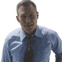 a man wearing a blue shirt and tie is smiling for the camera
