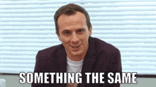 a man in a suit says something the same while looking at the camera