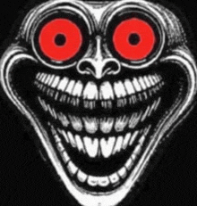 a drawing of a face with red eyes and teeth