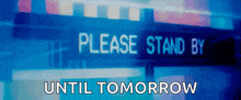 a sign that says please stand by until tomorrow on it